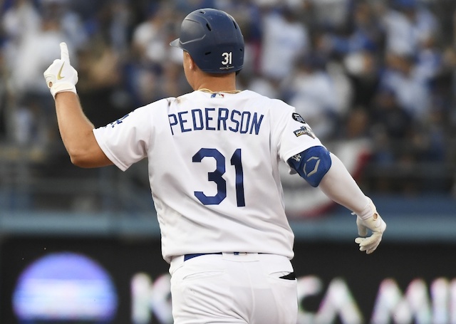 Los Angeles Dodgers outfielder Joc Pederson hits a double during Game 5 of the 2019 NLDS