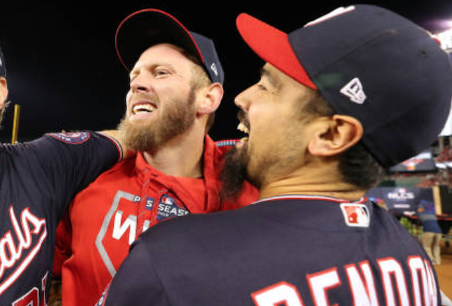 Washington Nationals teammates Anthony Rendon and Stephen Strasburg celebrate after winning the 2019 NLCS