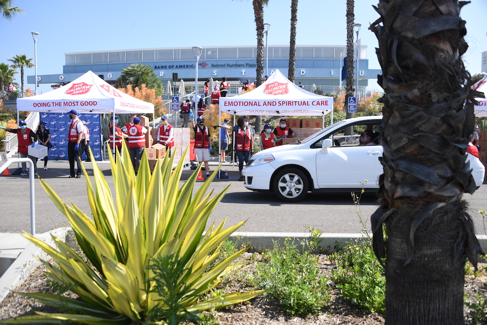 Los Angeles Dodgers Foundation & Salvation Army Distribute Meals To Families At Dodger Stadium