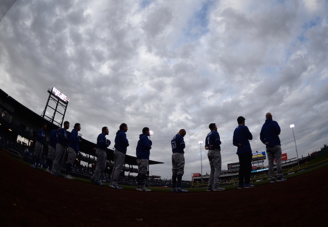 Mookie Betts, Max Muncy, AJ Pollock, Dodgers lined up, national anthem, Sloan Park view, 2021 Spring Training