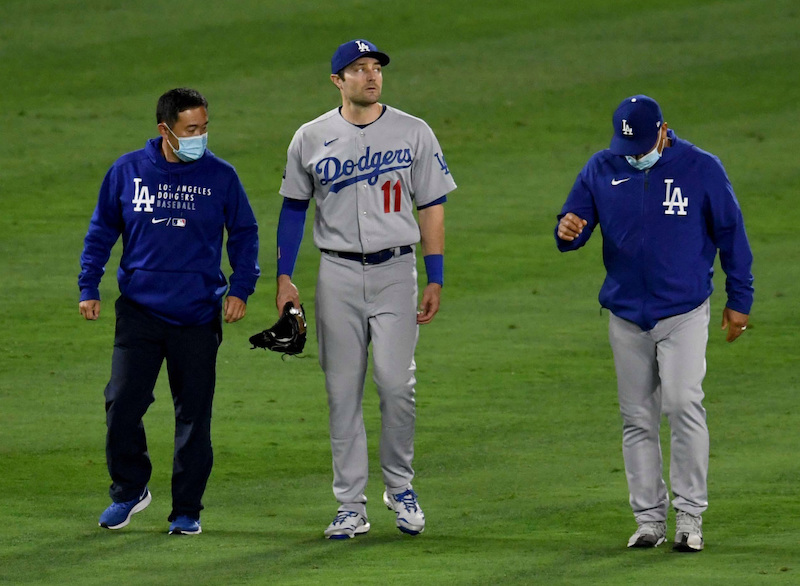 AJ Pollock, Dave Roberts, Dodgers trainer Yosuke "Possum" Nakajima