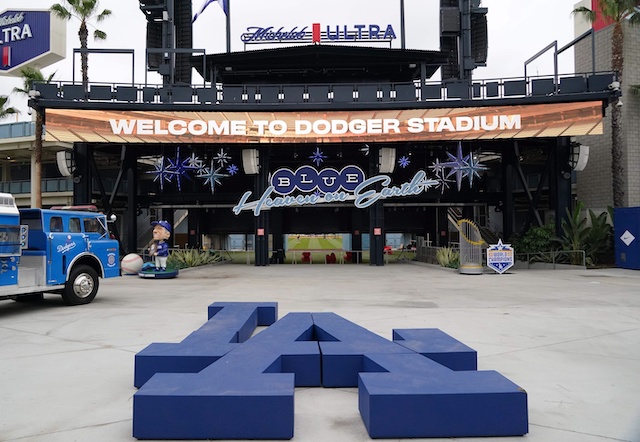 Tommy Lasorda bobblehead, 2020 World Series trophy, Dodger Stadium center field plaza, LA logo