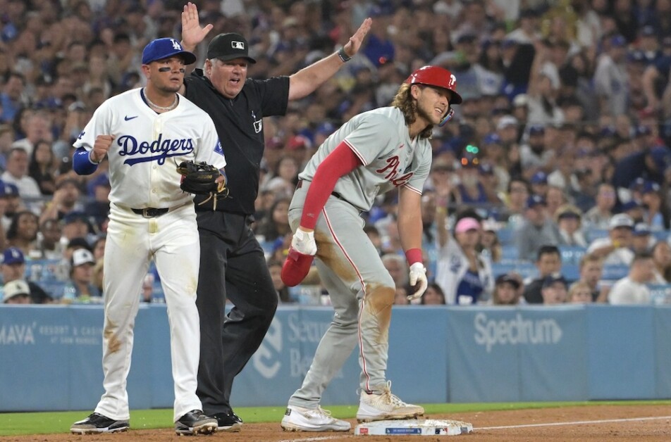 Miguel Rojas, Alec Bohm, umpire Hunter Wendelstedt