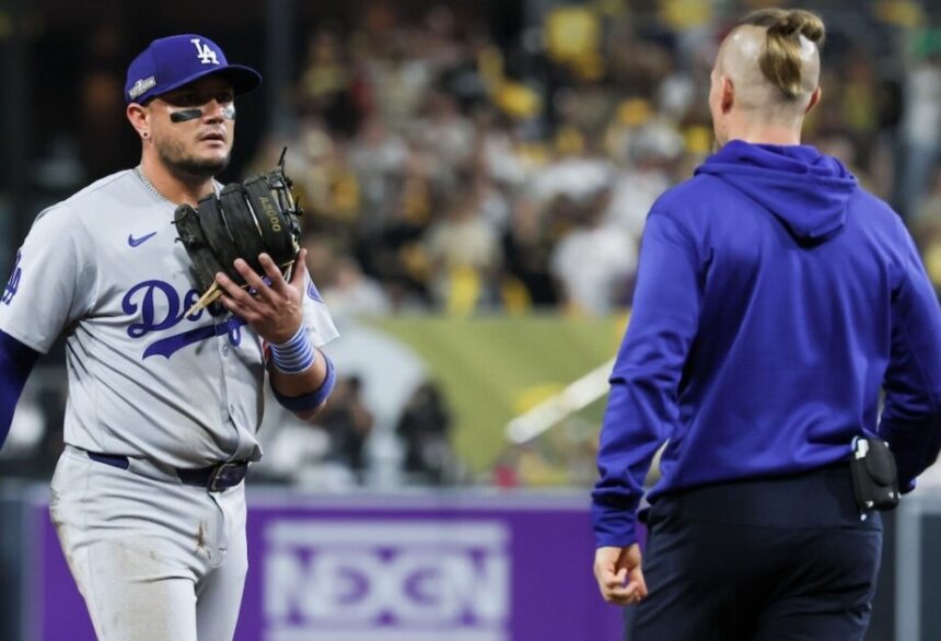 Miguel Rojas, Dodgers trainer Thomas Albert, 2024 NLDS