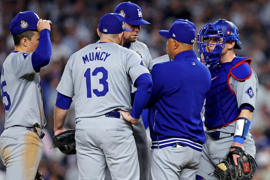 https://dodgerblue.com/wp-content/uploads/2024/11/Blake-Treinen-Tommy-Edman-Max-Muncy-Dave-Roberts-Will-Smith-mound-visit-2024-World-Series.jpg