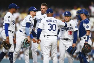 Dave Roberts, Miguel Rojas, Kiké Hernández, Freddie Freeman, Yoshinobu Yamamoto, Will Smith, pitching change
