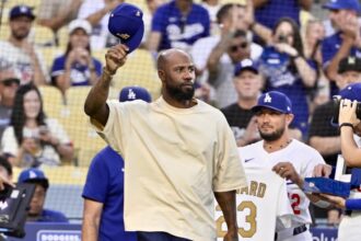 Jason Heyward, Miguel Rojas, Dodgers World Series ring, gold program jersey