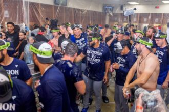 Alex Vesia, Edgardo Henriquez, Evan Phillips, NL West celebration