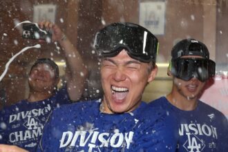 Yoshinobu Yamamoto, Hyeseong Kim, Yoshihiro Sonoda, NL West celebration