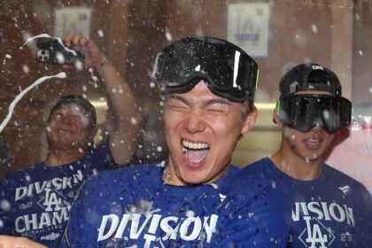Yoshinobu Yamamoto, Hyeseong Kim, Yoshihiro Sonoda, NL West celebration