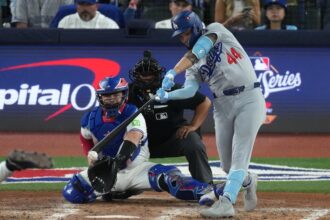 Andy Pages, Alejandro Kirk, umpire Adrian Johnson, 2025 World Series