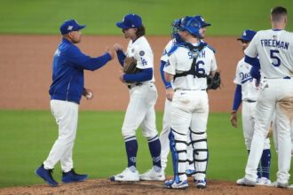 Dave Roberts, Justin Wrobleski, Will Smith, Max Muncy, Mookie Betts, Freddie Freeman, pitching change, 2025 World Series