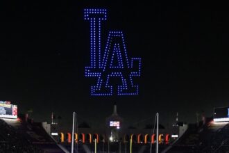 LA Dodgers logo, USC Trojans football drone show