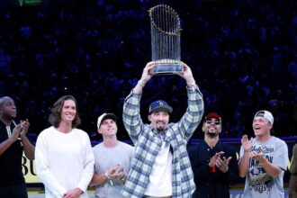 Magic Johnson, Tyler Glasnow, Will Smith, Blake Snell, Mookie Betts, Alex Call, 2025 World Series trophy