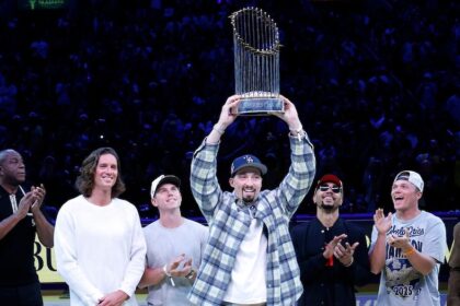 Magic Johnson, Tyler Glasnow, Will Smith, Blake Snell, Mookie Betts, Alex Call, 2025 World Series trophy