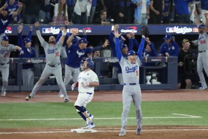 Freddie Freeman, Alejandro Kirk, Tommy Edman, Miguel Rojas, Ben Casparius, Chris Woodward, Dodgers win, 2025 World Series