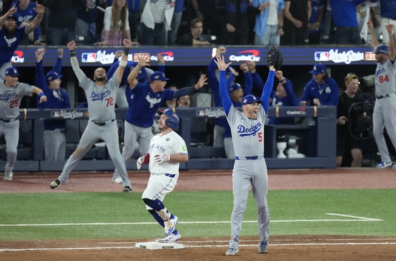 Freddie Freeman, Alejandro Kirk, Tommy Edman, Miguel Rojas, Ben Casparius, Chris Woodward, Dodgers win, 2025 World Series