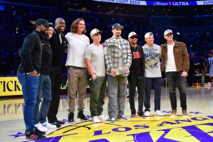 Teoscar Hernández, Mark Walter, Magic Johnson, Will Smith, Blake Snell, Mookie Betts, Alex Call, Evan Phillips, 2025 World Series trophy