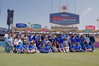 Teoscar Hernández, Santiago Espinal, Andy Pages, Holly Robinson Peete, Dodgers autism awareness clinic