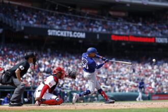 Mookie Betts, blue Dodgers alternate road jersey, umpire Gabe Morales