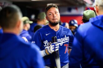 Miguel Rojas, blue Dodgers road jersey, Freeway Series