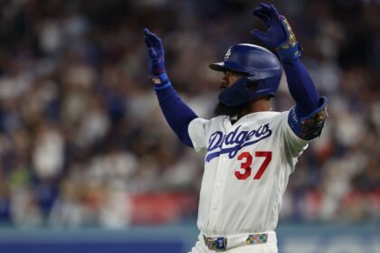 Teoscar Hernández autism awareness, Dodgers hip lock celebration, Childhood Cancer Awareness Night